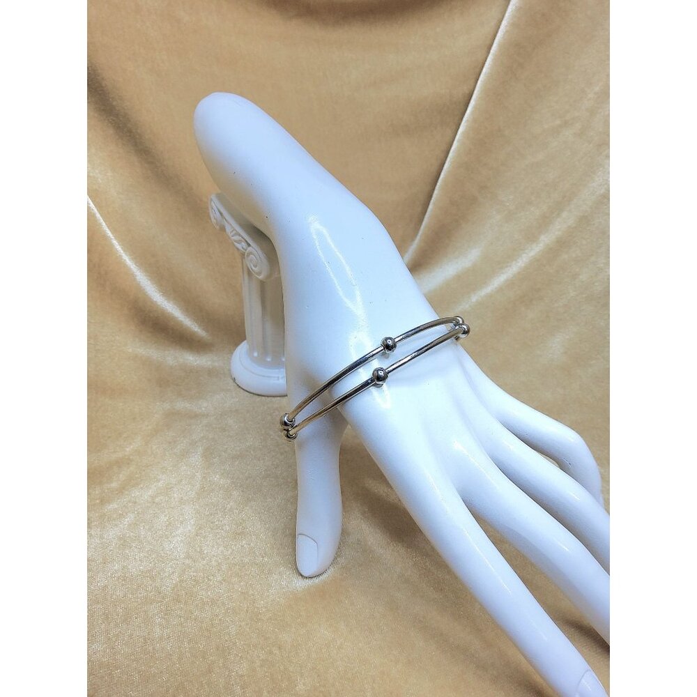 vintage pair of silver tone metal ball beads bangle bracelets